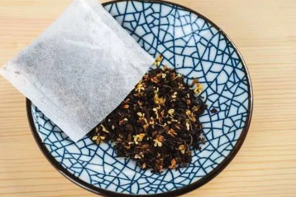 桂花九曲红梅如何制作，要将杂质去掉后再阴干